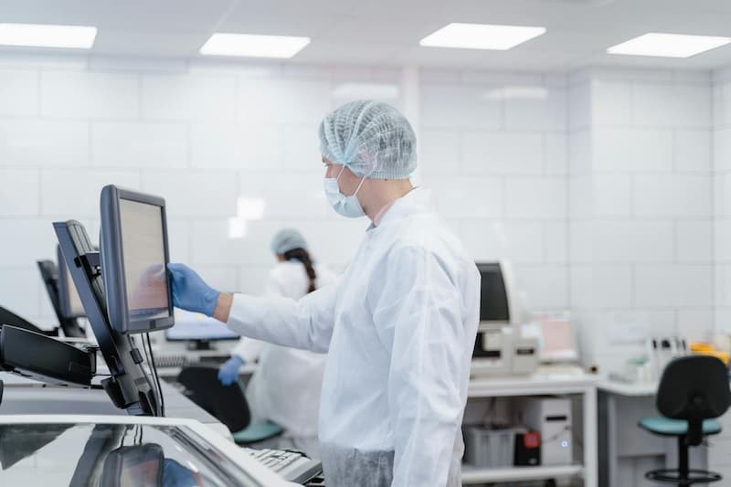 A research in a lab working on a computer